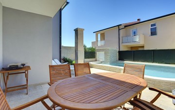 Moderna casa a schiera  per 6 persone con piscina privata,Wi-Fi