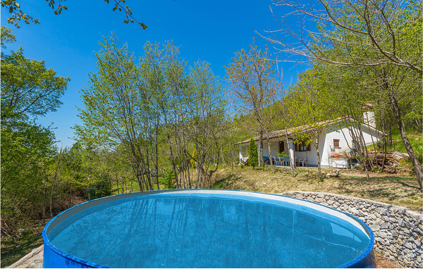 Unusual house in a forest on a glade with panoramic view