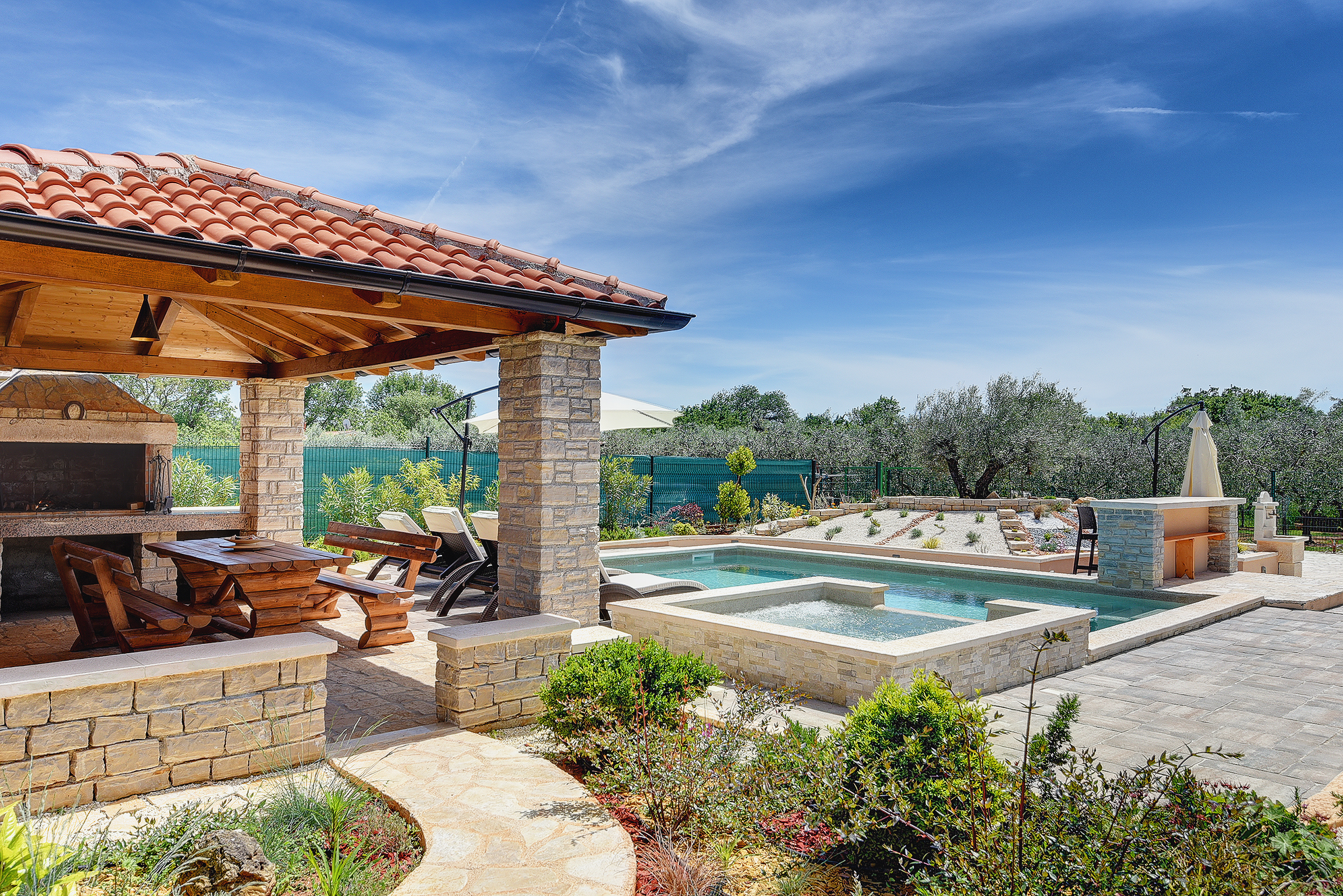 Villa with pool, sun terrace and beautifully landscaped garden