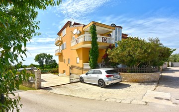 Apartments in Galizana with landscaped garden and children's play