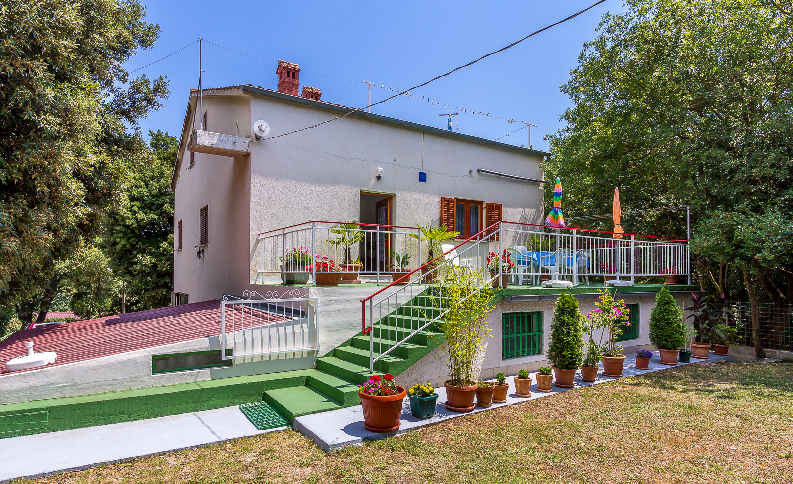 Casa vacanza con terrazza, barbecue e parco giochi per bambini