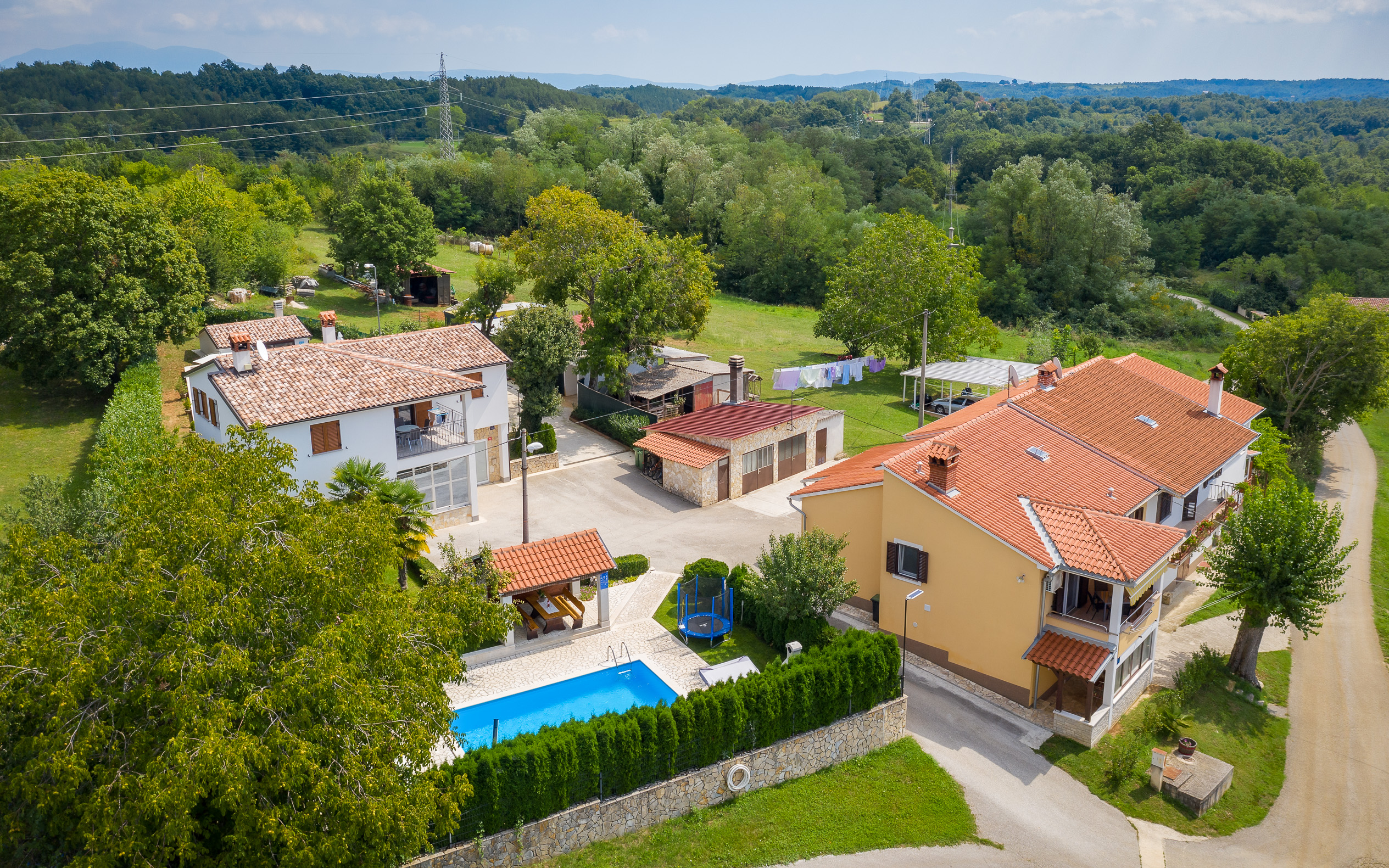 Villa with swimming pool, children playground and outside kitchen