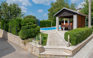 Villa with swimming pool, children playground and outside kitchen