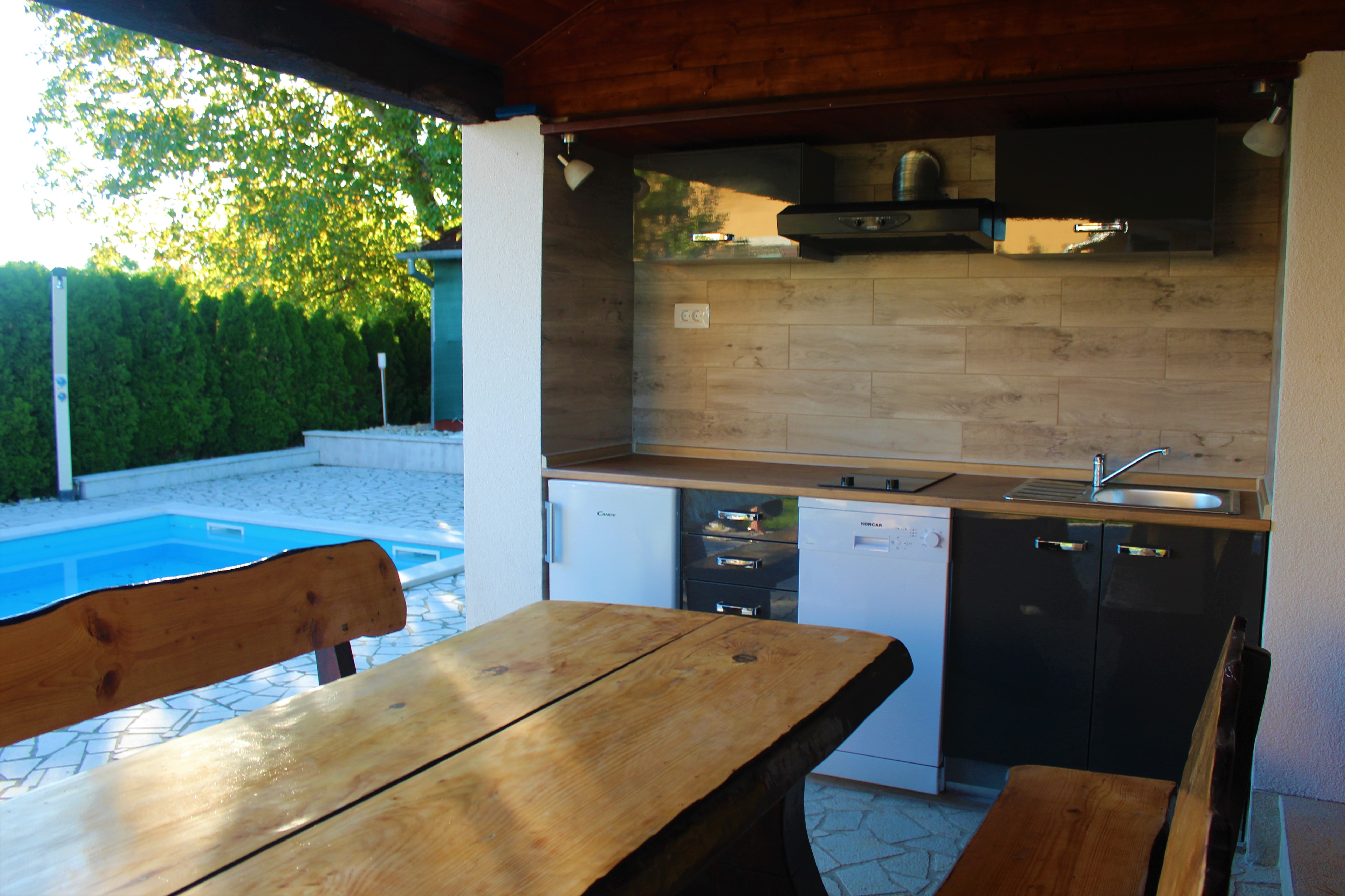 Villa with swimming pool, children playground and outside kitchen