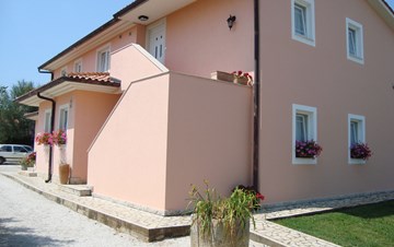 Nice house in Peroj offers accommodation in cozy apartments