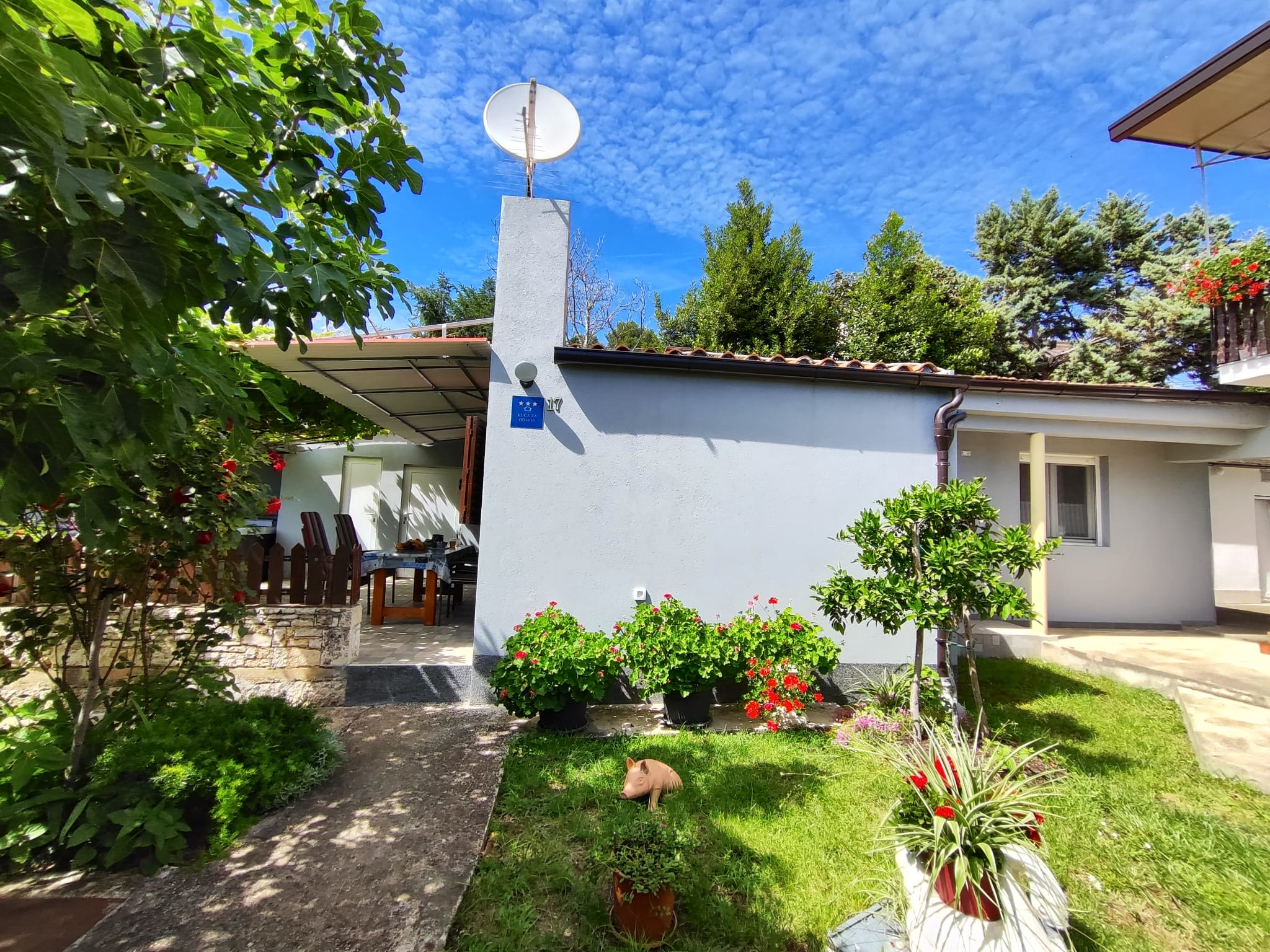 Casetta con giardino comune, parcheggio, aria condizionata, WIFI