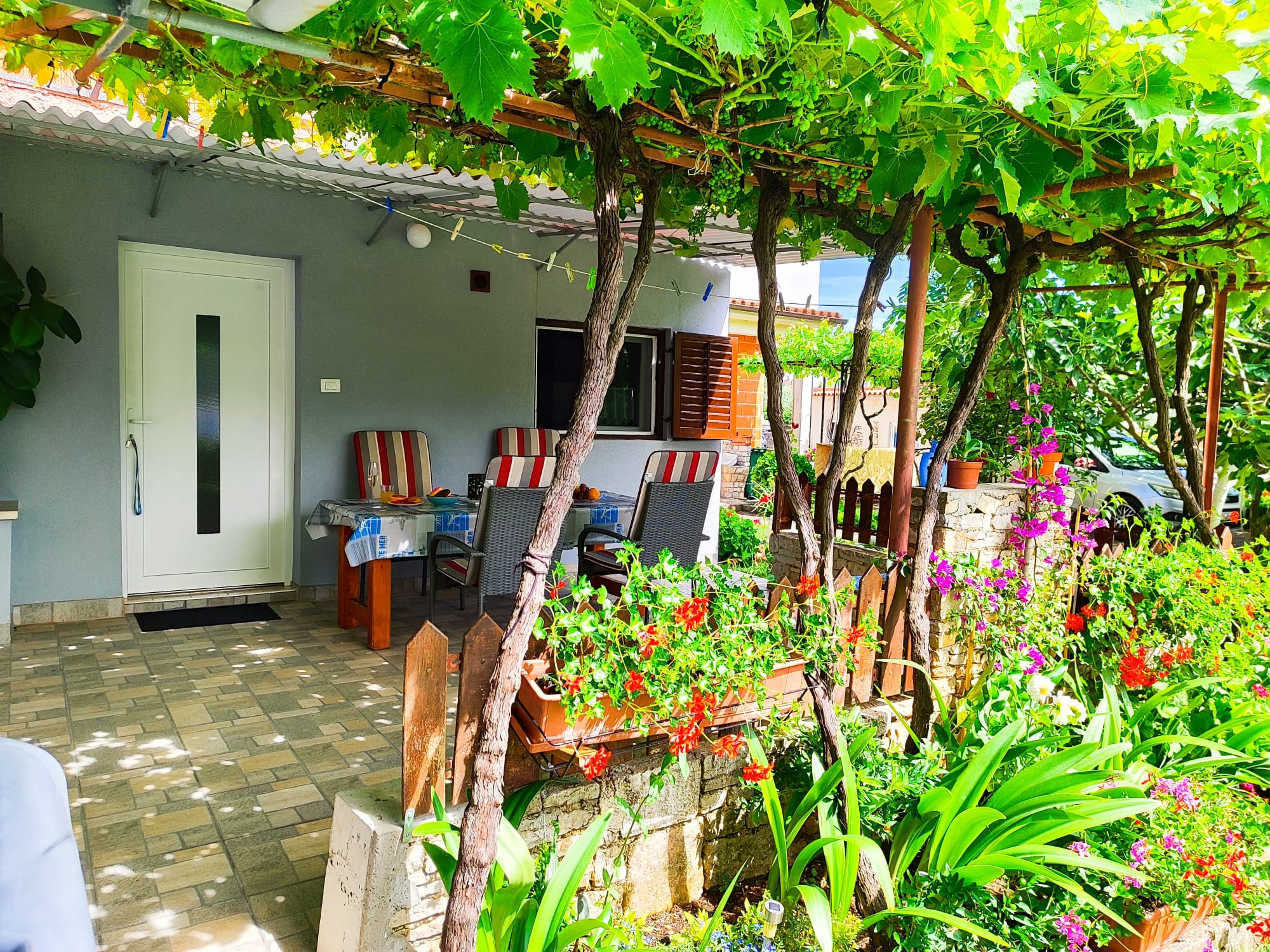 Casetta con giardino comune, parcheggio, aria condizionata, WIFI