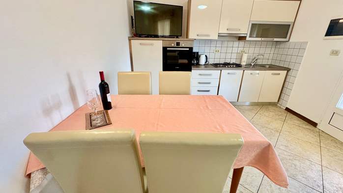 Two-bedroom apartment with shared outdoor pool and balcony, 2