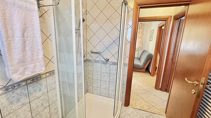 Two-bedroom apartment with shared outdoor pool and balcony, 10