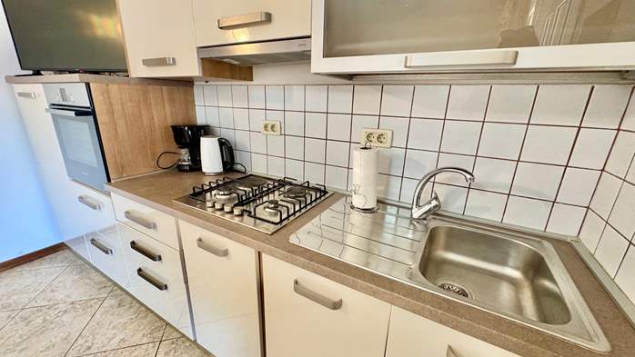 Two-bedroom apartment with shared outdoor pool and balcony, 5