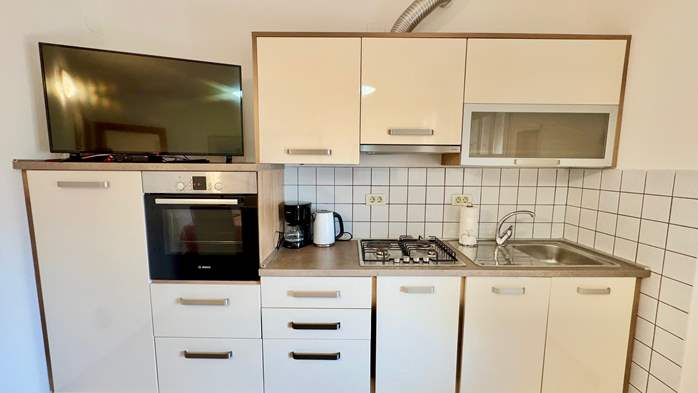 Two-bedroom apartment with shared outdoor pool and balcony, 4