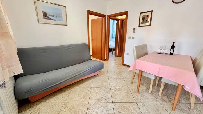 Two-bedroom apartment with shared outdoor pool and balcony, 3