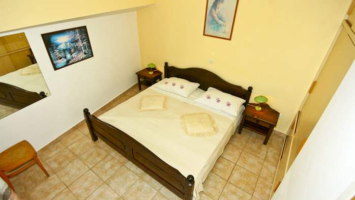 One-bedroom apartment with double bed, private balcony, pool, 2