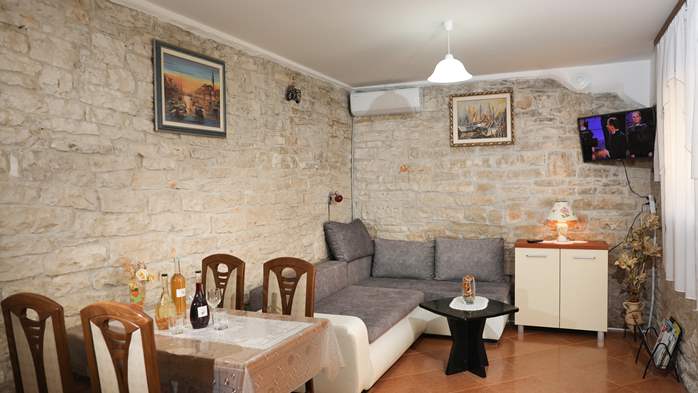 Apartment for 3 persons with stone details, pool, playground, 1