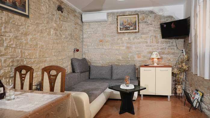 Apartment for 3 persons with stone details, pool, playground, 2
