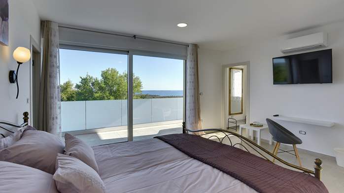Nova moderna vila s bazenom, saunom i pogledom na more, 35