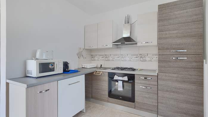 Appartamento per 5 persone con piscina, terrazza e parcheggio, 7