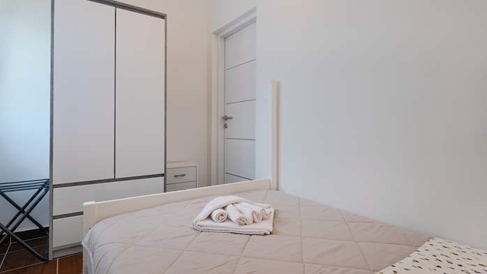 Appartamento per 5 persone con piscina, terrazza e parcheggio, 17