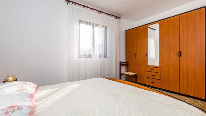 Appartamento a Medolino per 4 persone con due camere, 2 bagni, 13