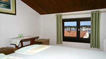 Arranged room with a bathroom in the attic with a sea view, 2