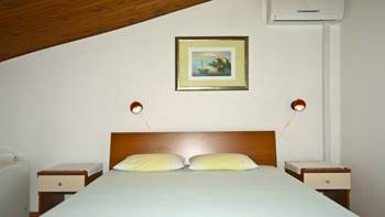 Arranged room with a bathroom in the attic with a sea view, 8